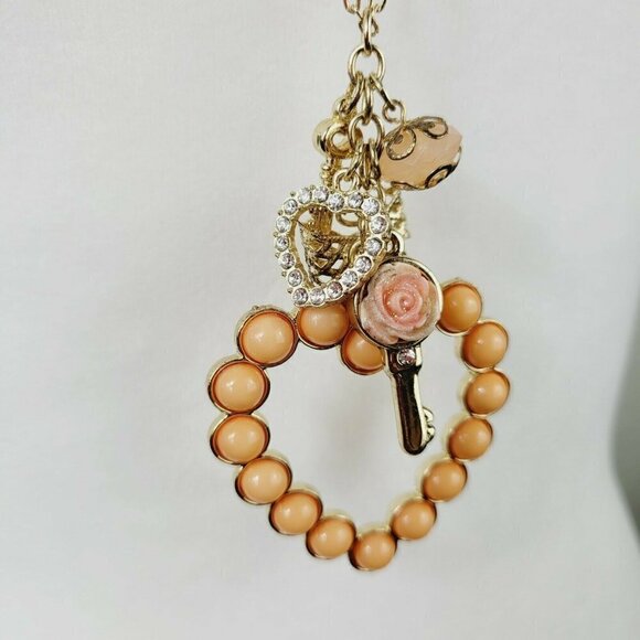 Statement Heart Necklace Romantic Style Gold Tone Bow Bead Charms Acrylic Long - Picture 4 of 9